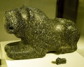 Figure of a lion and counter in the shape of a lion.jpg